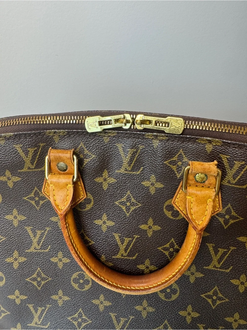 Authentic Louis Vuitton Classic Monogram Alma , Leather Top-Handle Bag in Brown